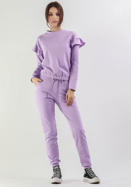 lilac tracksuit with ruffles on the blouse
