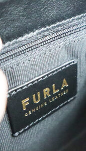 cum depistezi dacă o geantă Furla e autentică_detalii etichetă intereioară stanță Furla „genuine leather”